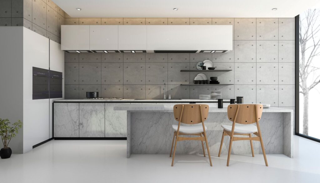 Minimalistische Kueche in Betonoptik mit Marmorinsel – modernes Design aus dem Kuechenstudio Freiberg